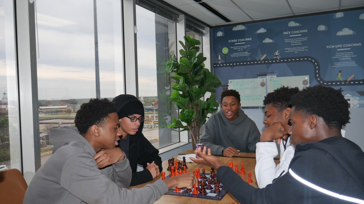 Champions engaged in strategy and discussion